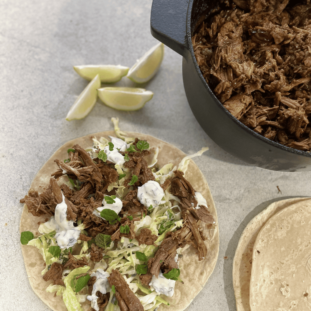 Tandoori Slow Cooked Lamb Leg served with Flat Breads & Crunchy Herb Slaw