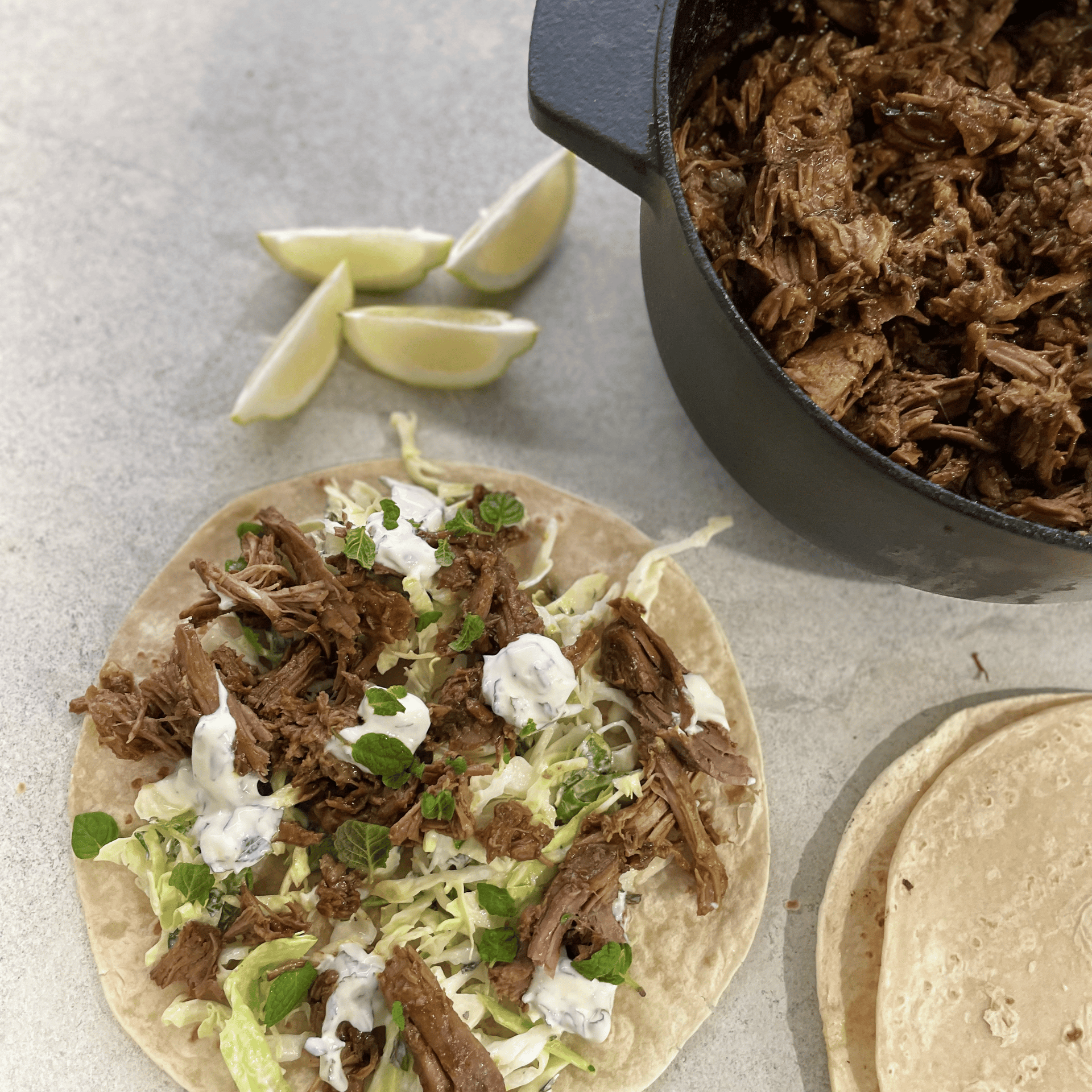 Tandoori Slow Cooked Lamb Leg served with Flat Breads & Crunchy Herb Slaw